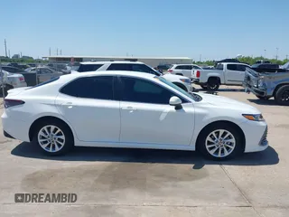 2023 Toyota Camry LE z VIN 4T1C11AKXPU804367, wystawiony jako IAAI lot #42019545 z przebiegiem 23 737 mil mil oraz . Historia ofert i sprzedaży dostępna na DreamBid. Obrazek 13.
