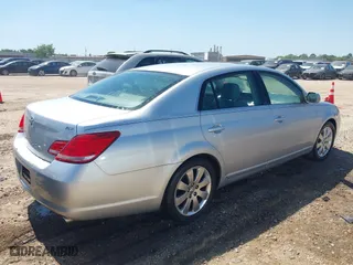 2005 Toyota Avalon XL with VIN 4T1BK36B95U047763, listed as a IAAI auction lot 41996438 with 224,315 mi miles. Bid and sale history available at carsss.com. Image 4.