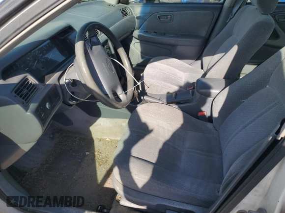 2000 Toyota Camry CE z VIN JT2BG28K8Y0467211, wystawiony jako Copart lot #55478835 z przebiegiem Nie podano mil oraz Szkoda całkowita • Salvage title. Historia ofert i sprzedaży dostępna na DreamBid. Obrazek 7.