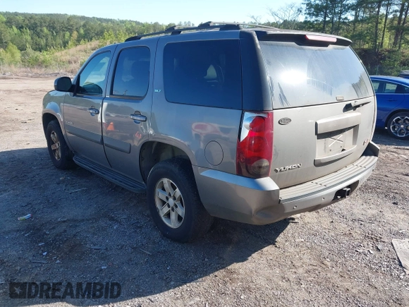 2007 GMC Yukon SLT with VIN 1GKFC13J57J103418, listed as a IAAI auction lot 41955682 with 318,338 mi miles. Bid and sale history available at carsss.com. Image 3.
