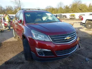 2015 Chevrolet Traverse LT with VIN 1GNKRGKDXFJ355145, listed as a IAAI auction lot 41427073 with 128,394 mi miles. Bid and sale history available at carsss.com. Image 1.