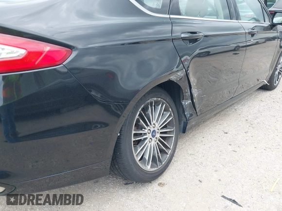 2013 Ford Fusion SE with VIN 3FA6P0H90DR274822, listed as a IAAI auction lot 42386000 with 142,342 mi miles and . Bid and sale history available at DreamBid. Image 6.