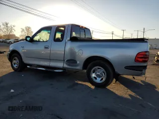 2001 Ford F-150 XL with VIN 2FTRX07L51CA91232, listed as a Copart auction lot 88556635 with 268,582 mi miles and Salvage Title. Bid and sale history available at carsss.com. Image 2.