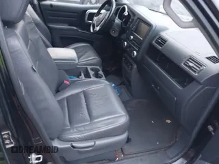 2007 Honda Ridgeline RTL z VIN 2HJYK16527H510681, wystawiony jako IAAI lot #40920924 z przebiegiem Nie podano mil oraz . Historia ofert i sprzedaży dostępna na DreamBid. Obrazek 5.