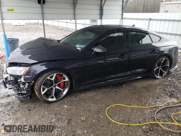2023 Audi RS 5 Sportback z VIN WUAAWCF58PA903057, wystawiony jako Copart lot #47098845 z przebiegiem Nie podano mil oraz Szkoda całkowita • Salvage title. Historia ofert i sprzedaży dostępna na DreamBid. Obrazek 1.