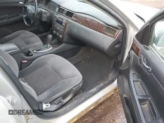 2013 Chevrolet Impala LS with VIN 2G1WF5E31D1154096, listed as a IAAI auction lot 41649749 with 204,860 mi miles and . Bid and sale history available at DreamBid. Image 5.