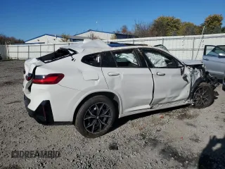 2023 BMW X4 M40i with VIN 5UX43DT05P9N61777, listed as a Copart auction lot 77600264 with 0 mi miles and Salvage Title. Bid and sale history available at carsss.com. Image 3.