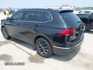 2023 Volkswagen Tiguan SE with VIN 3VVNB7AX5PM017938, listed as a IAAI auction lot 42453818 with 177,906 mi miles and . Bid and sale history available at DreamBid. Image 3.