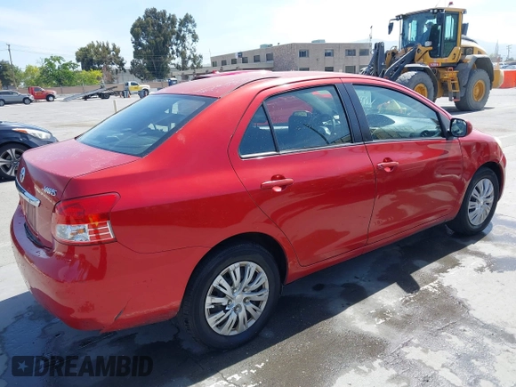 2009 Toyota Yaris with VIN JTDBT903591342243, listed as a IAAI auction lot 42104557 with 407,106 mi miles. Bid and sale history available at carsss.com. Image 4.