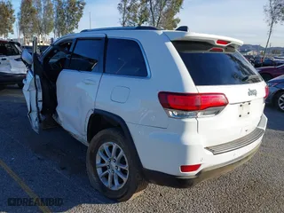 2021 Jeep Grand Cherokee Laredo X with VIN 1C4RJEAG2MC719395, listed as a IAAI auction lot 41338484 with 99,636 mi miles. Bid and sale history available at carsss.com. Image 3.