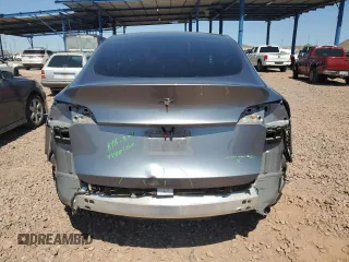 2024 Tesla Model Y Long Range z VIN 7SAYGDEE6RA322800, wystawiony jako Copart lot #49470595 z przebiegiem 16 372 mil mil oraz Szkoda całkowita • Salvage title. Historia ofert i sprzedaży dostępna na DreamBid. Obrazek 6.
