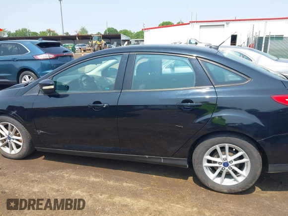 2017 Ford Focus SE with VIN 1FADP3F25HL292056, listed as a IAAI auction lot 42409320 with 102,956 mi miles and . Bid and sale history available at DreamBid. Image 14.