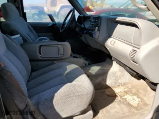 1999 Chevrolet Tahoe Z71 with VIN 1GNEK13R0XJ512661, listed as a Copart auction lot 68022173 with 181,573 mi miles and Salvage Title. Bid and sale history available at carsss.com. Image 7.
