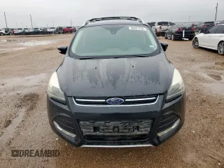 2014 Ford Escape Titanium с VIN 1FMCU0J90EUA04690, выставлен на аукционе Copart как лот 58421735 с пробегом 200 743 миль миль и Чистый • Clean title. История ставок и продаж доступна на DreamBid. Изображение 5.