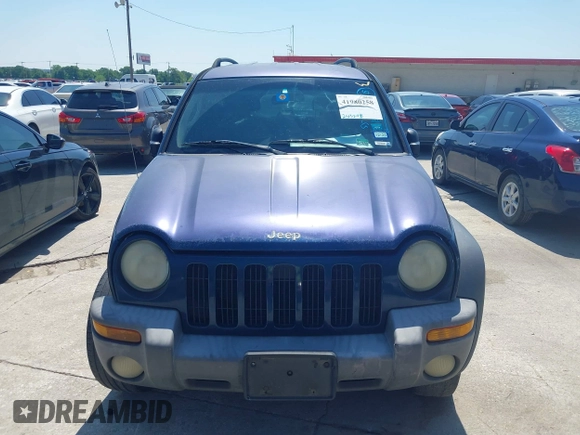 2004 Jeep Liberty Sport with VIN 1J4GK48KX4W241129, listed as a IAAI auction lot 41980258 with 259,048 mi miles and . Bid and sale history available at DreamBid. Image 6.
