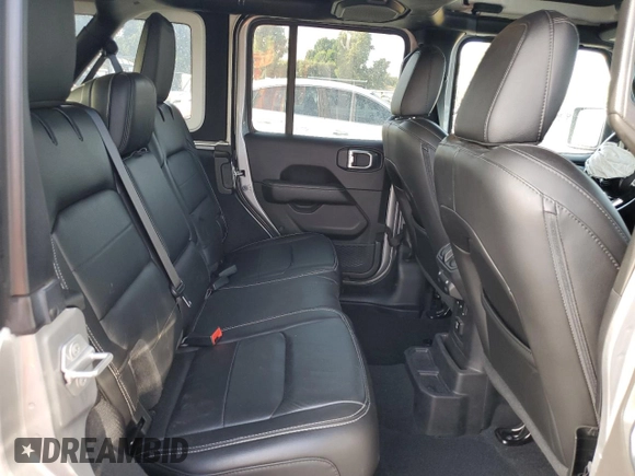 2019 Jeep Wrangler Unlimited Sahara with VIN 1C4HJXEN0KW616942, listed as a Copart auction lot 63501755 with 57,095 mi miles and Salvage title. Bid and sale history available at DreamBid. Image 11.