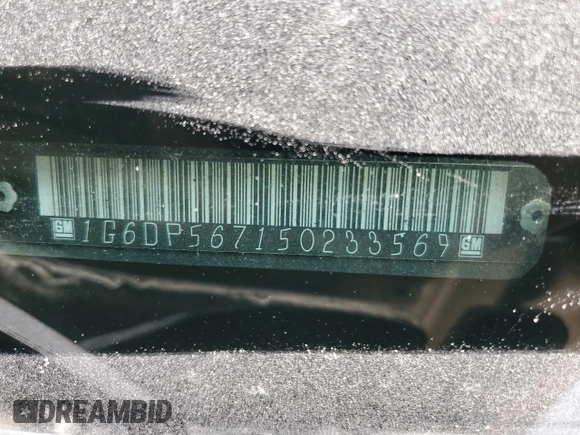 2005 Cadillac CTS z VIN 1G6DP567150233569, wystawiony jako Copart lot #51690995 z przebiegiem Nie podano mil oraz Szkoda całkowita • Salvage title. Historia ofert i sprzedaży dostępna na DreamBid. Obrazek 13.