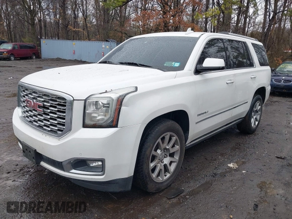 2016 GMC Yukon Denali with VIN 1GKS2CKJ2GR144167, listed as a IAAI auction lot 41953465 with 89,209 mi miles. Bid and sale history available at carsss.com. Image 2.
