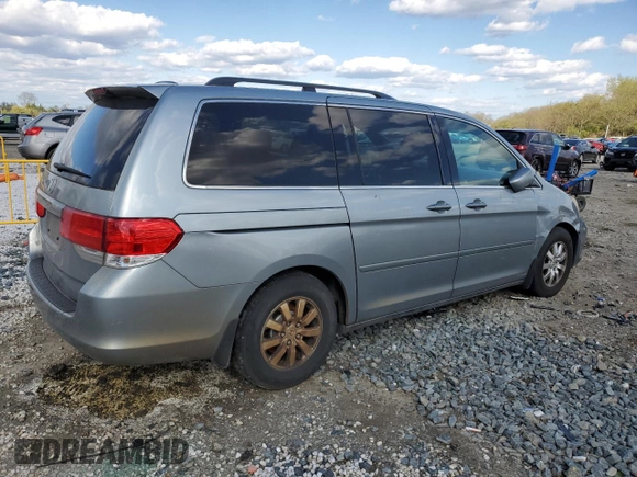 2010 Honda Odyssey EX-L with VIN 5FNRL3H78AB030903, listed as a Copart auction lot 52911705 with 200,499 mi miles and Salvage Title. Bid and sale history available at carsss.com. Image 3.