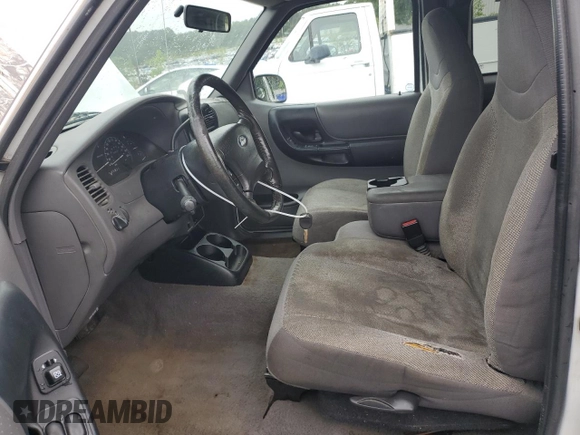 2002 Ford Ranger XL Fleet with VIN 1FTYR44U82TA21001, listed as a Copart auction lot 58392305 with 234,824 mi miles and Salvage title. Bid and sale history available at DreamBid. Image 7.