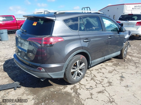 2016 Toyota RAV4 XLE with VIN 2T3RFREV4GW437875, listed as a IAAI auction lot 41694951 with 136,098 mi miles. Bid and sale history available at carsss.com. Image 4.