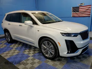 2024 Cadillac XT6 FWD Premium Luxury with VIN 1GYKPCRS7RZ738830, listed as a Copart auction lot 69222864 with 9,891 mi miles and Clean Title. Bid and sale history available at carsss.com. Image 4.