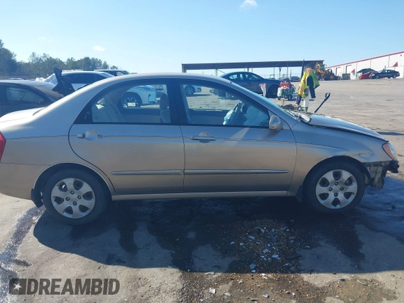 2004 Kia Spectra LX with VIN KNAFE121745039519, listed as a IAAI auction lot 41482402 with 201,123 mi miles. Bid and sale history available at carsss.com. Image 14.