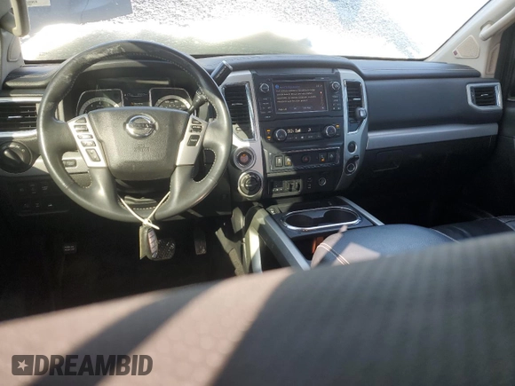 2017 Nissan Titan SV with VIN 1N6AA1E58HN554233, listed as a Copart auction lot 45388595 with 83,813 mi miles and Salvage Title. Bid and sale history available at DreamBid. Image 8.