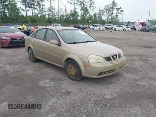 2004 Suzuki Forenza S z VIN KL5JD52Z24K995110, wystawiony jako IAAI lot #41909662 z przebiegiem 110 274 mil mil oraz . Historia ofert i sprzedaży dostępna na DreamBid. Obrazek 1.