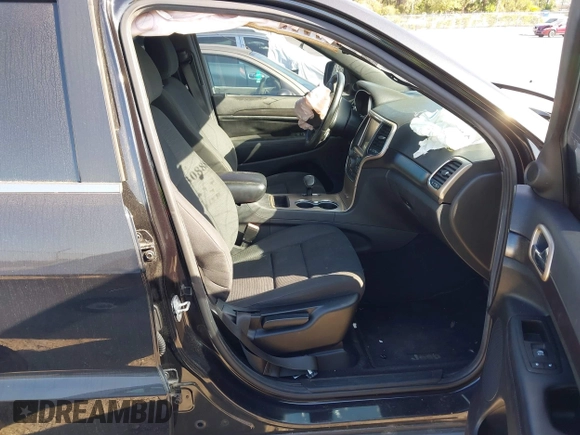 2014 Jeep Grand Cherokee Laredo with VIN 1C4RJEAG7EC263590, listed as a IAAI auction lot 41699106 with 136,581 mi miles and . Bid and sale history available at DreamBid. Image 5.