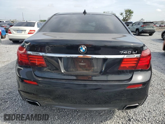 2014 BMW 7 Series 740Li with VIN WBAYE4C52ED138770, listed as a Copart auction lot 53647665 with 106,827 mi miles and Salvage title. Bid and sale history available at DreamBid. Image 6.