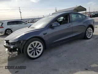 2022 Tesla Model 3 with VIN 5YJ3E1EA5NF285499, listed as a Copart auction lot 48598845 with 119,698 mi miles and Clean Title. Bid and sale history available at DreamBid. Image 1.