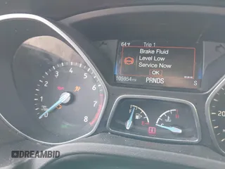 2016 Ford Focus SE with VIN 1FADP3FE6GL208688, listed as a IAAI auction lot 40980789 with 105,954 mi miles. Bid and sale history available at carsss.com. Image 7.