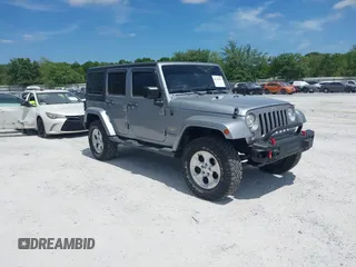 2015 Jeep Wrangler Unlimited Sahara with VIN 1C4BJWEG3FL549651, listed as a IAAI auction lot 42142813 with 142,106 mi miles and . Bid and sale history available at DreamBid. Image 1.