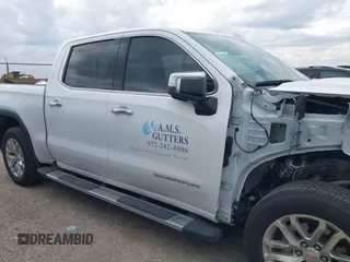 2020 GMC Sierra 1500 SLT z VIN 3GTU9DED1LG451500, wystawiony jako IAAI lot #41351345 z przebiegiem 53 576 mil mil oraz . Historia ofert i sprzedaży dostępna na DreamBid. Obrazek 13.