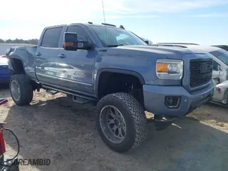 2015 GMC Sierra 2500HD SLT with VIN 1GT12ZE82FF604897, listed as a IAAI auction lot 41650192 with 132,479 mi miles. Bid and sale history available at carsss.com. Image 1.