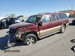 2000 Chevrolet Suburban LS with VIN 3GNEC16T2YG160819, listed as a Copart auction lot 77664344 with 200,816 mi miles and Salvage title. Bid and sale history available at DreamBid. Image 1.