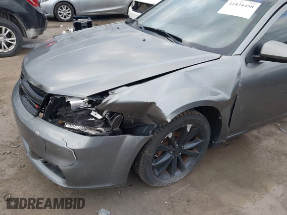 2013 Dodge Avenger SXT with VIN 1C3CDZCB7DN746154, listed as a IAAI auction lot 41834458 with 161,906 mi miles and . Bid and sale history available at DreamBid. Image 6.