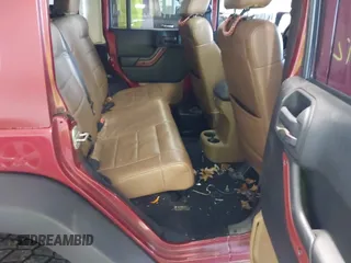 2011 Jeep Wrangler Unlimited Rubicon with VIN 1J4BA6H18BL584486, listed as a IAAI auction lot 42340661 with 152,896 mi miles and . Bid and sale history available at DreamBid. Image 8.