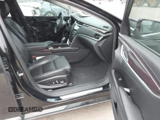 2017 Cadillac XTS Luxury with VIN 2G61M5S39H9166549, listed as a IAAI auction lot 41593859 with 164,557 mi miles. Bid and sale history available at carsss.com. Image 5.