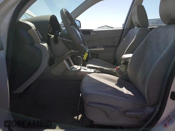 2010 Subaru Forester X with VIN JF2SH6AC0AH743775, listed as a Copart auction lot 60884835 with 127,481 mi miles and Salvage title. Bid and sale history available at DreamBid. Image 7.