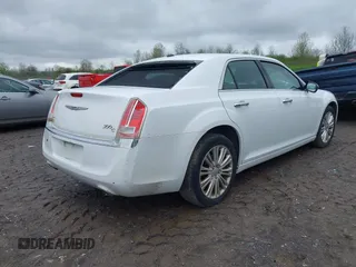 2014 Chrysler 300 C with VIN 2C3CCAKG5EH200996, listed as a IAAI auction lot 42201747 with 156,121 mi miles and . Bid and sale history available at carsss.com. Image 4.
