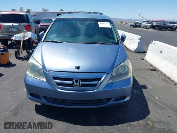 2006 Honda Odyssey EX with VIN 5FNRL38466B065601, listed as a IAAI auction lot 42559342 with 258,995 mi miles and . Bid and sale history available at DreamBid. Image 6.