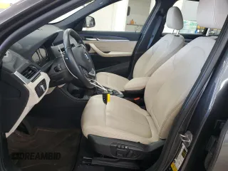 2021 BMW X1 xDrive28i with VIN WBXJG9C00M5S35249, listed as a Copart auction lot 61895775 with 34,641 mi miles and Salvage title. Bid and sale history available at DreamBid. Image 7.