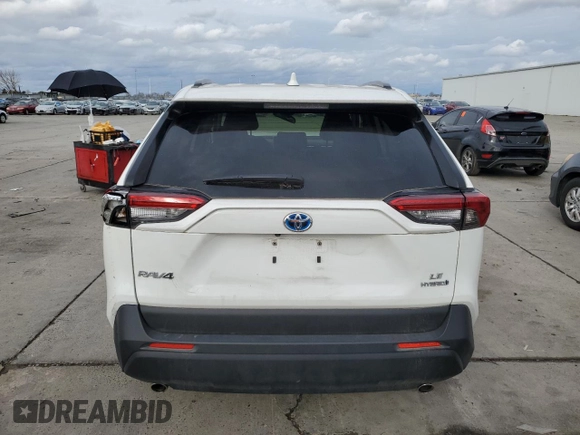 2023 Toyota RAV4 Hybrid LE with VIN JTMMWRFV3PD570648, listed as a Copart auction lot 86983174 with 27,258 mi miles and Salvage title. Bid and sale history available at DreamBid. Image 6.