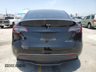 2024 Tesla Model Y Long Range with VIN 7SAYGDEEXRA253111, listed as a Copart auction lot 60929295 with 16,423 mi miles and Salvage title. Bid and sale history available at DreamBid. Image 6.