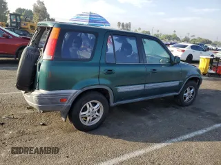 2000 Honda CR-V EX with VIN JHLRD1861YC020765, listed as a Copart auction lot 74510874 with 125,654 mi miles and Salvage Title. Bid and sale history available at carsss.com. Image 3.