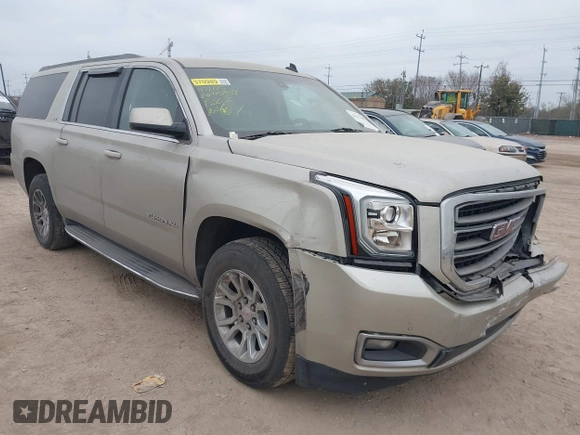 2015 GMC Yukon XL SLE z VIN 1GKS1GKC1FR155056, wystawiony jako IAAI lot #41517607 z przebiegiem 174 634 mil mil oraz . Historia ofert i sprzedaży dostępna na DreamBid. Obrazek 1.