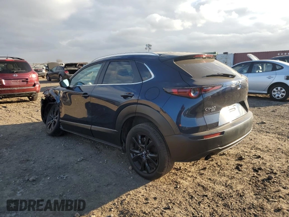 2022 Mazda CX-30 2.5 Turbo with VIN 3MVDMBAY8NM459690, listed as a Copart auction lot 84376874 with 24,723 mi miles and Salvage Title. Bid and sale history available at DreamBid. Image 2.