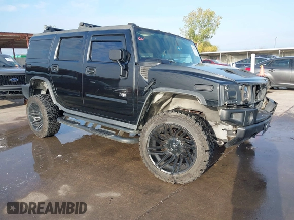 2003 Hummer H2 z VIN 5GRGN23UX3H112173, wystawiony jako IAAI lot #41093359 z przebiegiem Nie podano mil oraz . Historia ofert i sprzedaży dostępna na DreamBid. Obrazek 1.